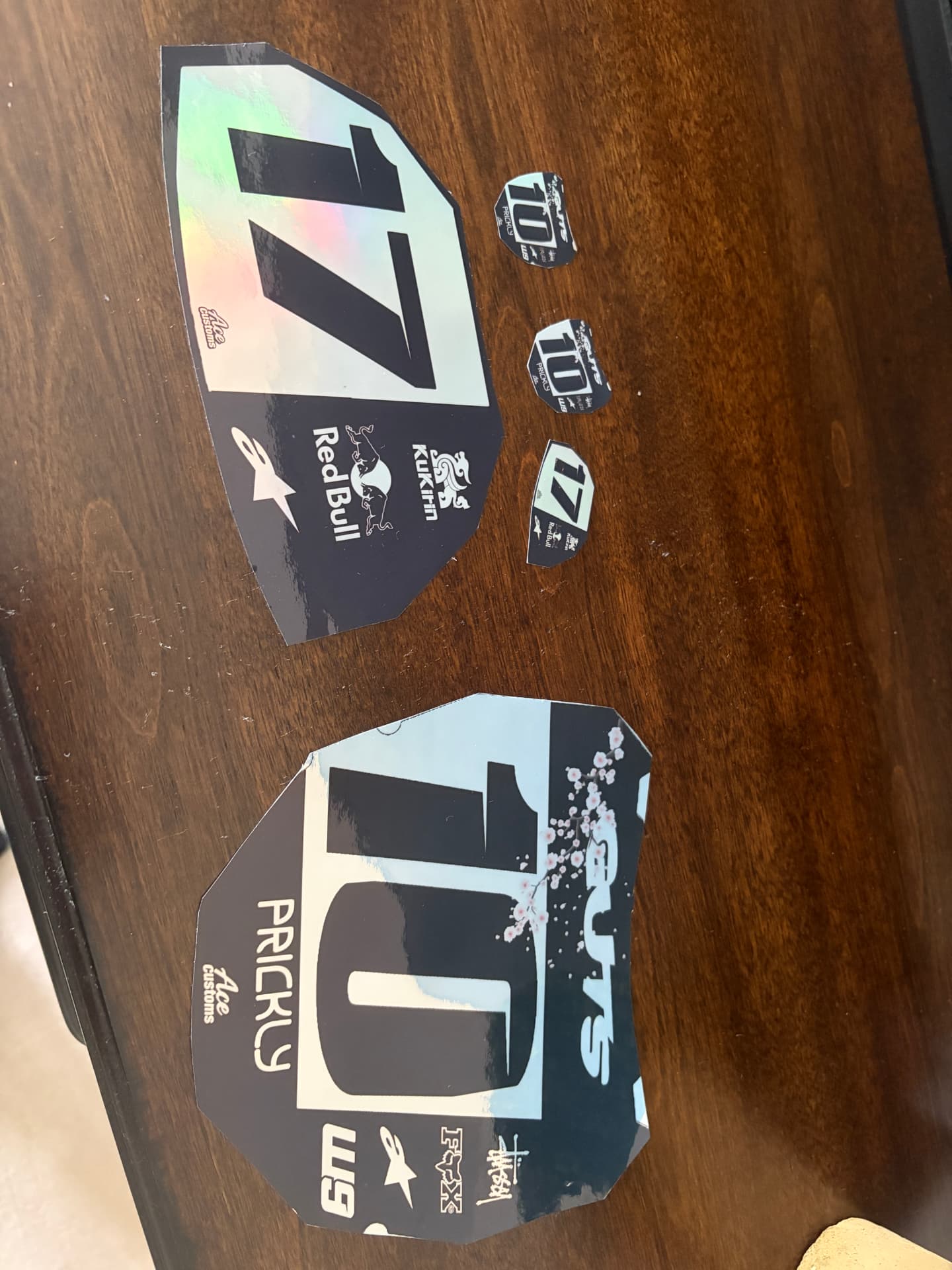 Two custom number boards with cherry blossom artwork
